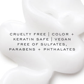 Kristin Ess label close-up showing biotin and amino acids for fortifying benefits