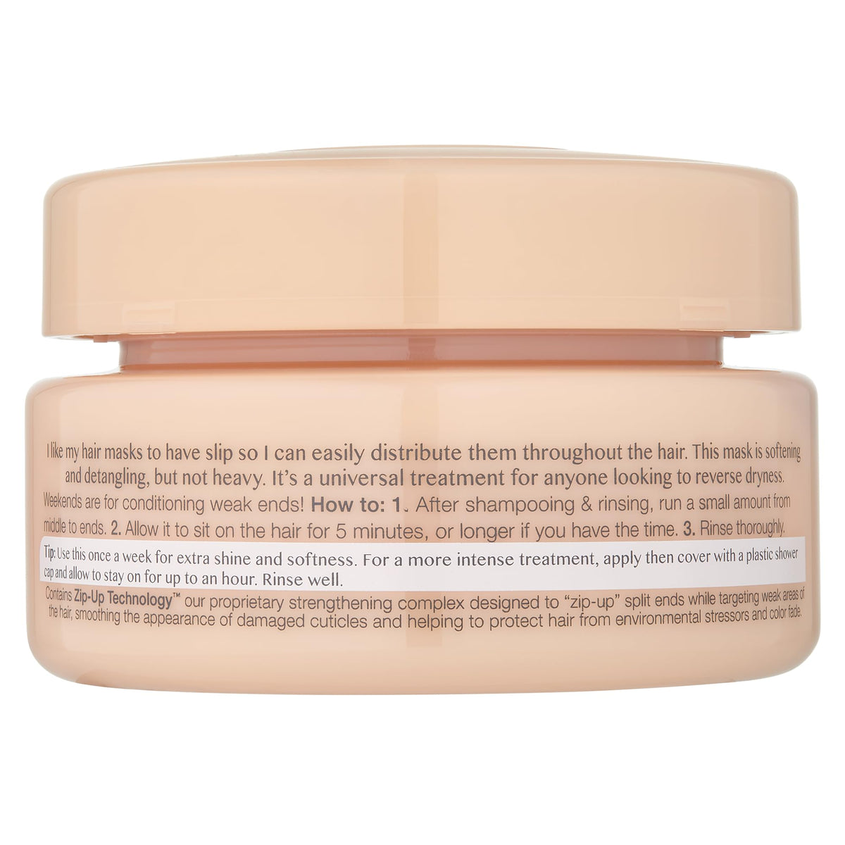 Kristin Ess open jar texture showcasing creamy moisturizing formula