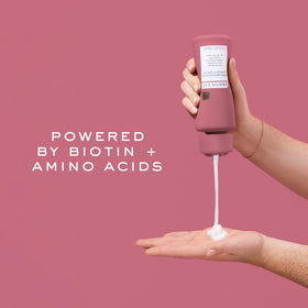 Kristin Ess dispensed conditioner texture showing creamy formula and easy application benefit