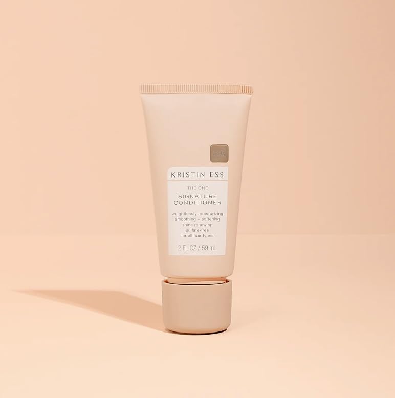 Kristin Ess duo in toiletry bag lifestyle image showing portability and travel-ready styling