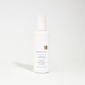 Kristin Ess hair in use being detangled for smoother styling and less breakage