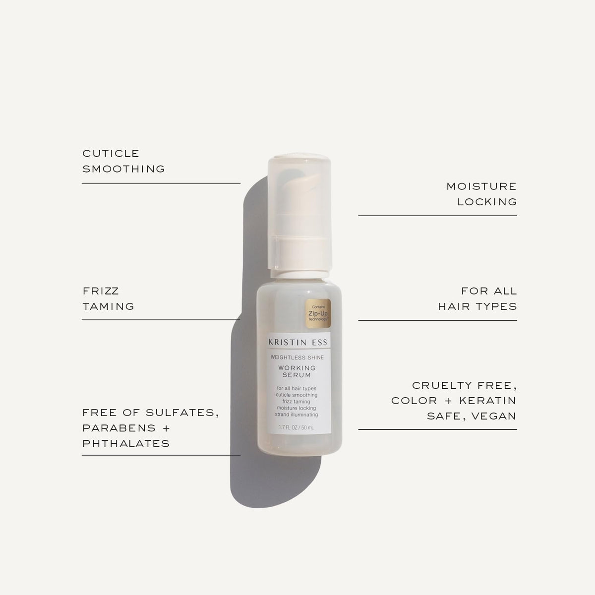 Kristin Ess in-use detangling spray smoothing wet hair for easier styling