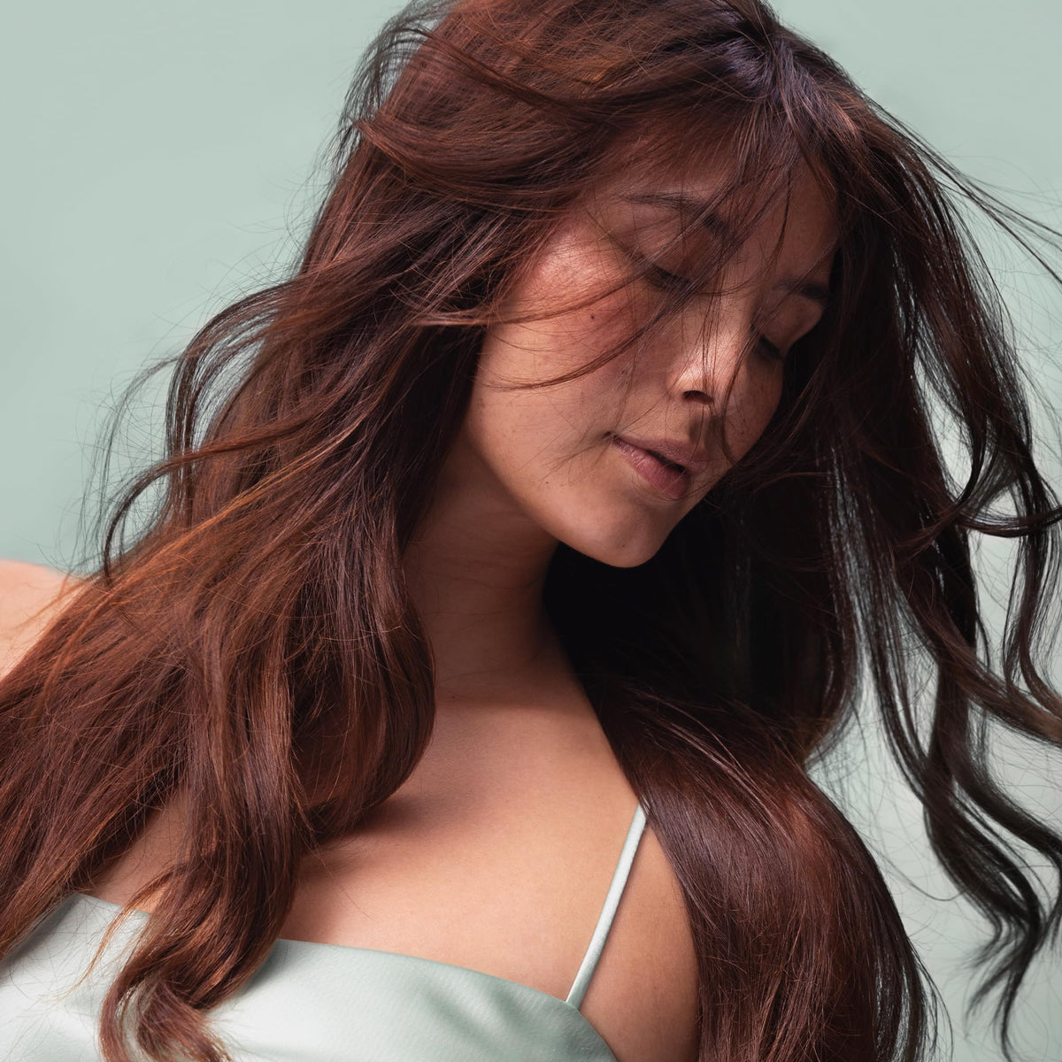 Kristin Ess product label highlighting keratin and color-safe benefits for protected hair