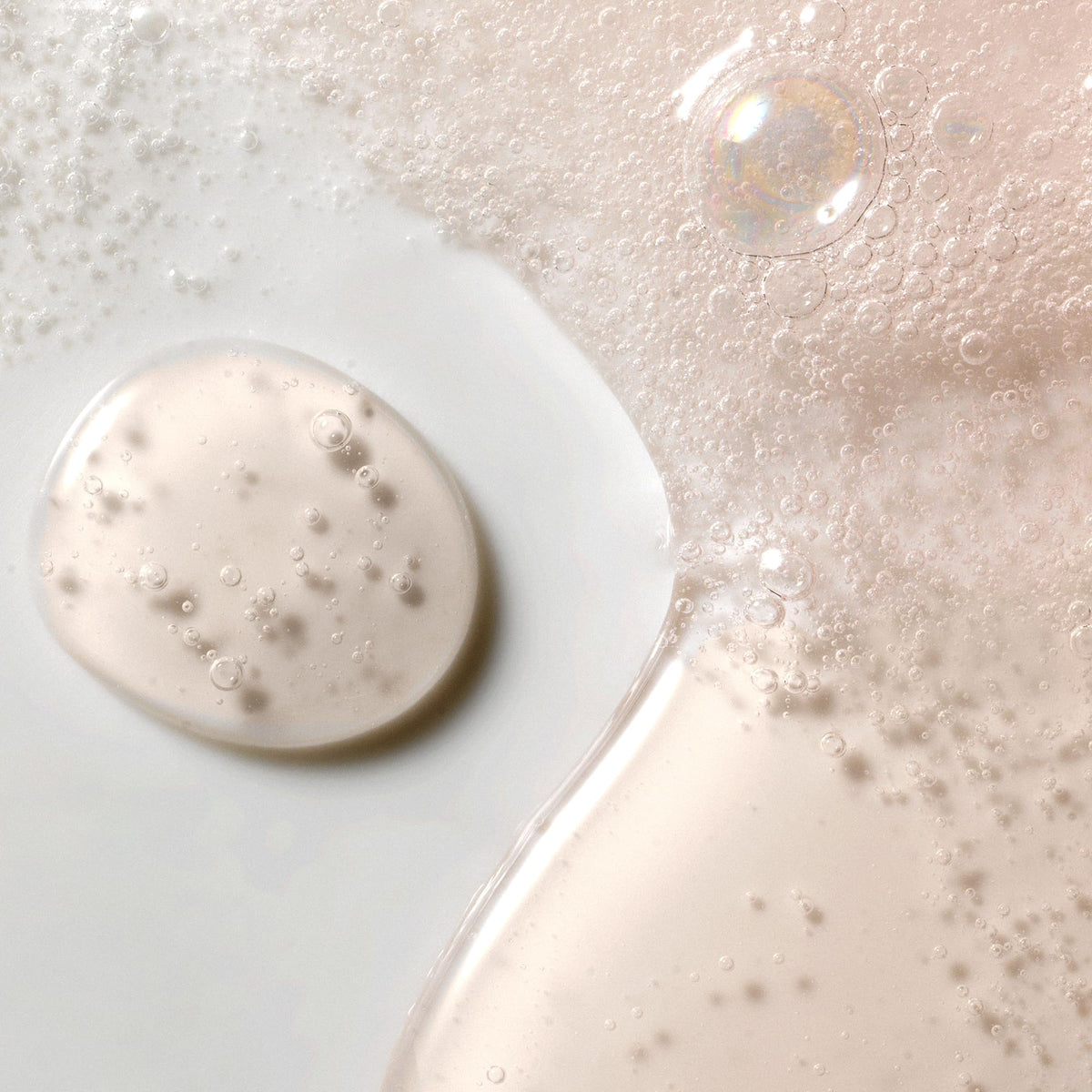 Kristin Ess rich lather on hair demonstrating deep-cleansing action