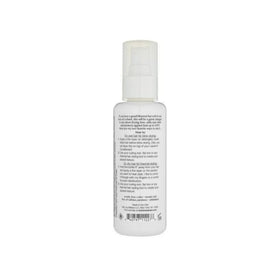 Kristin Ess spray on bathroom counter in styling routine for hydrated hair