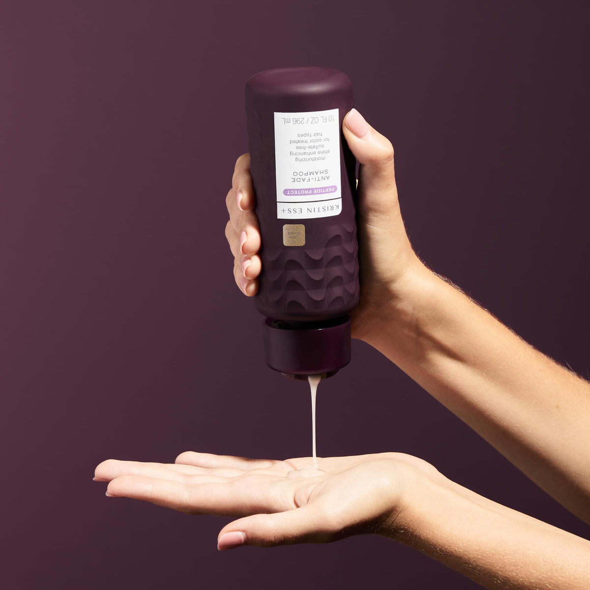 Kristin Ess pump dispenser close-up demonstrating easy daily use
