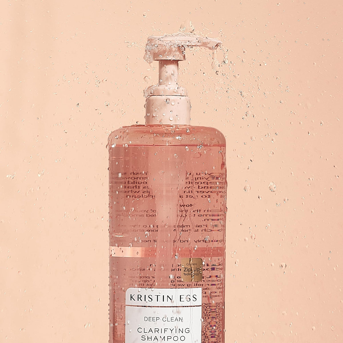 Kristin Ess pump top and label close-up for easy dispensing benefit