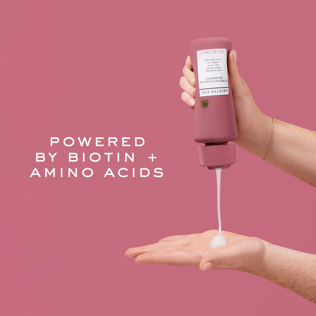 Kristin Ess shampoo label close-up highlighting biotin and sulfate-free benefits