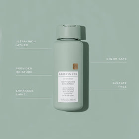 Kristin Ess shampoo lather in hand demonstrating clarifying cleanse and lightweight foam