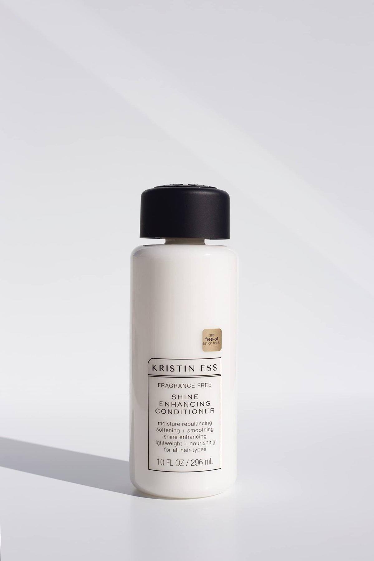 Kristin Ess shampoo texture closeup demonstrating gentle lather