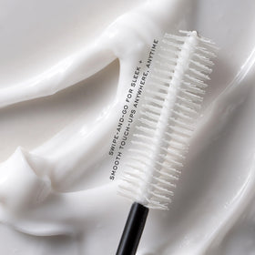 Kristin Ess sleek ponytail after use illustrating frizz control benefit