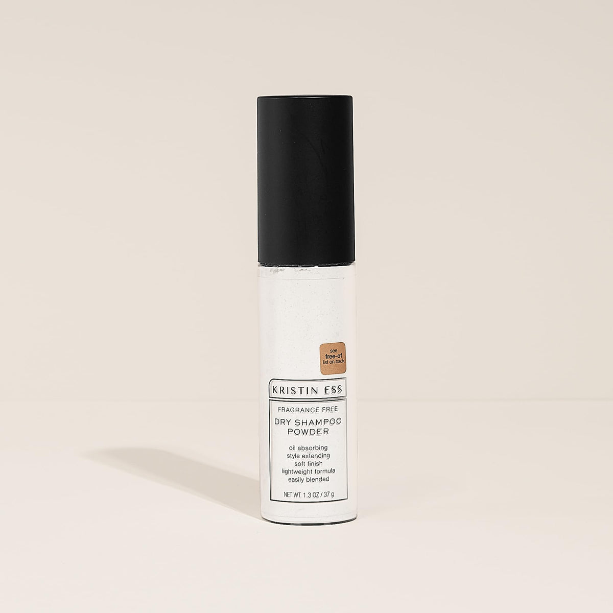 Kristin Ess compact in a travel bag demonstrating portability and quick refresh benefit
