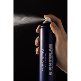 Kryolan mist on model locking makeup for camera-ready wear