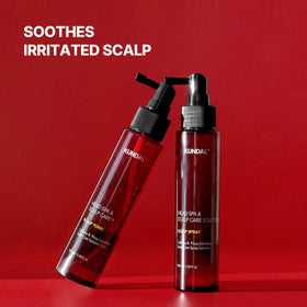 KUNDAL bottle beside peppermint and tea tree highlighting natural ingredients