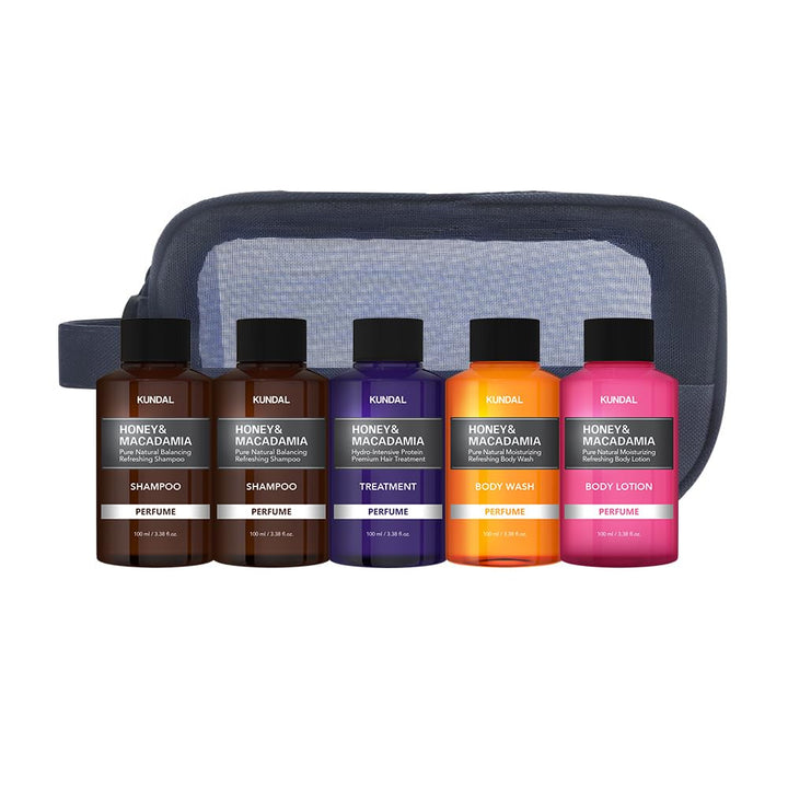 KUNDAL five-piece set front view showing bottles and bag, easy travel benefit
