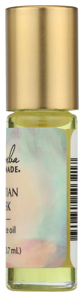 Kuumba Made drops in ceramic oil burner producing subtle home fragrance