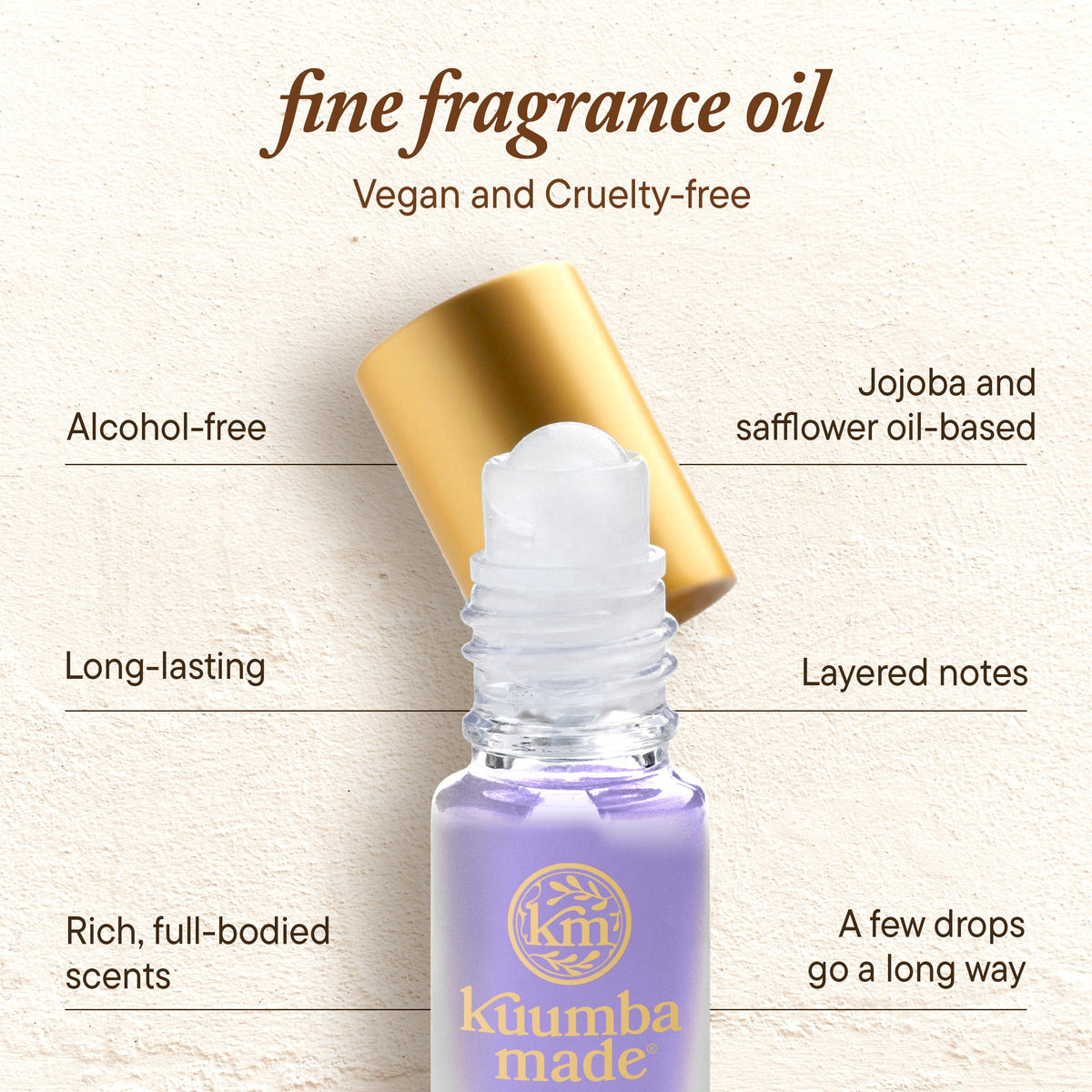 Kuumba Made roll-on held in hand to show true size and travel-ready convenience