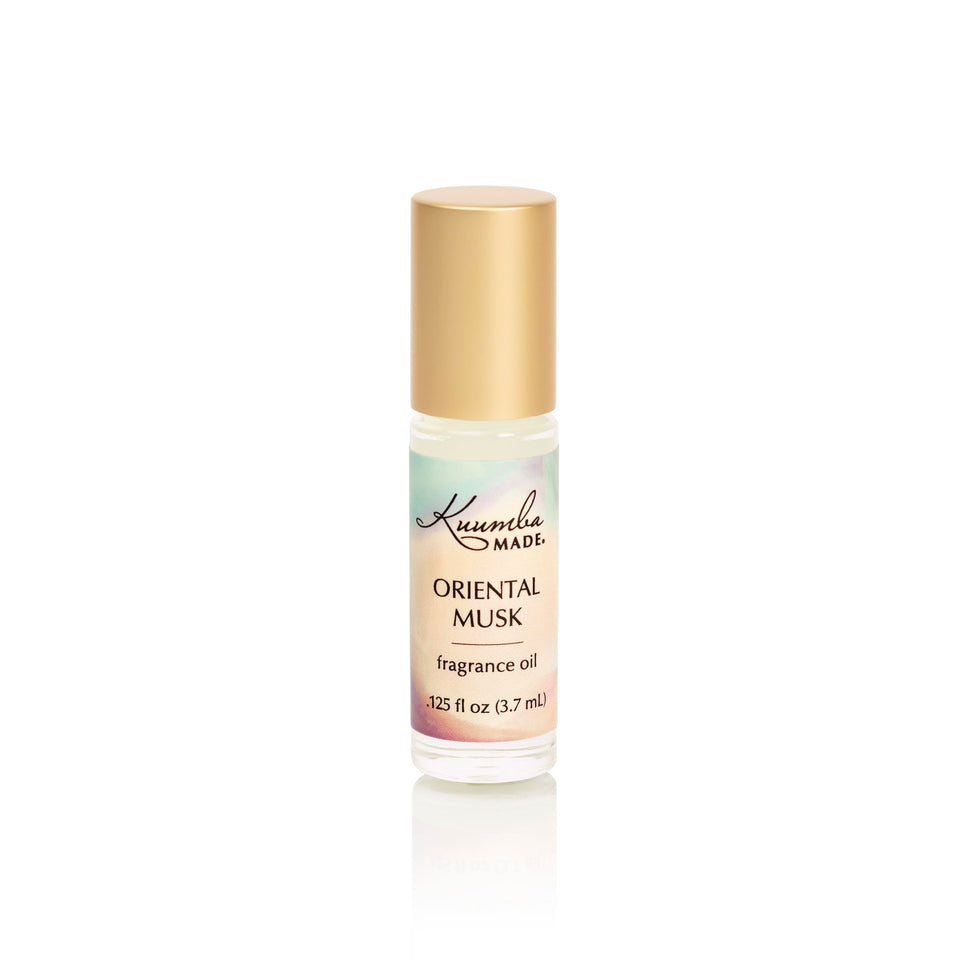 Kuumba Made front view of roll-on bottle showing label and compact design, easy travel