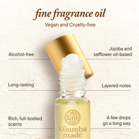 Kuumba Made bottle in hand to illustrate compact 0.15 fl oz travel-friendly size