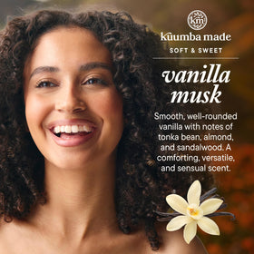 Kuumba Made oil drop on fingertip showing rich safflower texture and skin nourishment