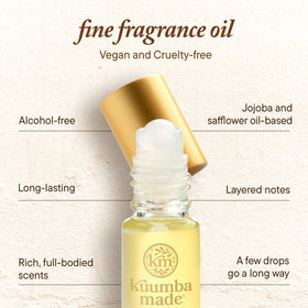 Applying Kuumba Made Water Goddess on wrist for long-lasting scent and gentle skin feel
