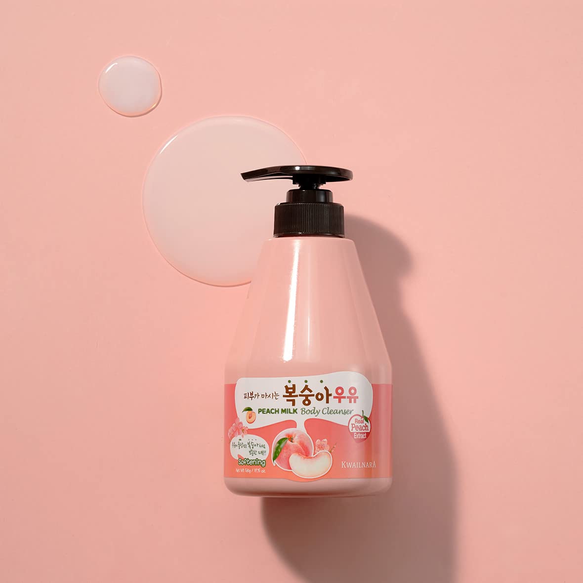 Shower shelf scene with Kwailnara Peach Milk bottle conveying a soothing ritual