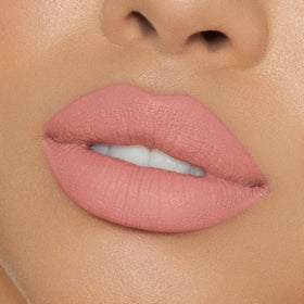 Kylie Cosmetics KOKO K swatch on skin demonstrating true pale pink payoff
