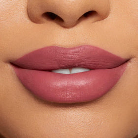 Kylie Cosmetics Posie K on model lips showing long-wear definition benefit