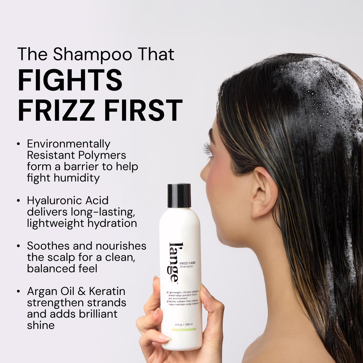 l'ange hair bottle held in hand to show 8 fl oz size and travel convenience