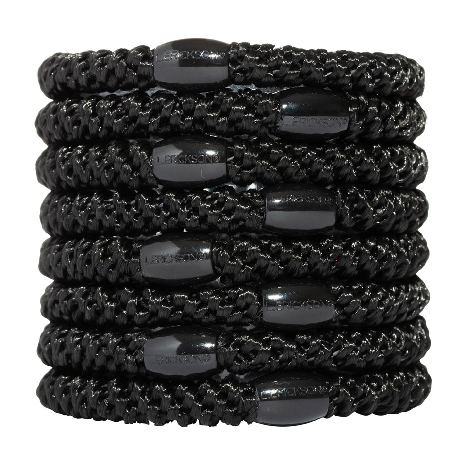 L. Erickson front pack of eight black ponytail holders shown neatly displayed, easy organization benefit