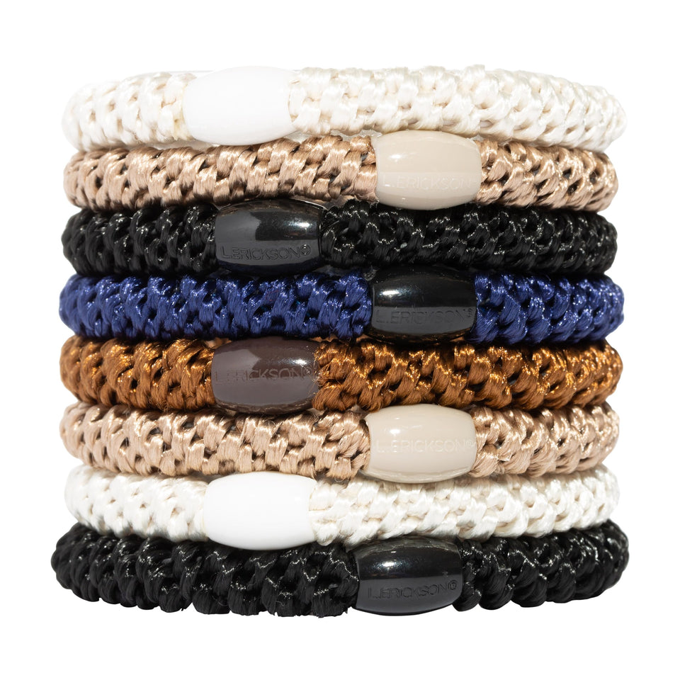 L. Erickson front packaging showing neutral brown and black ties and benefits