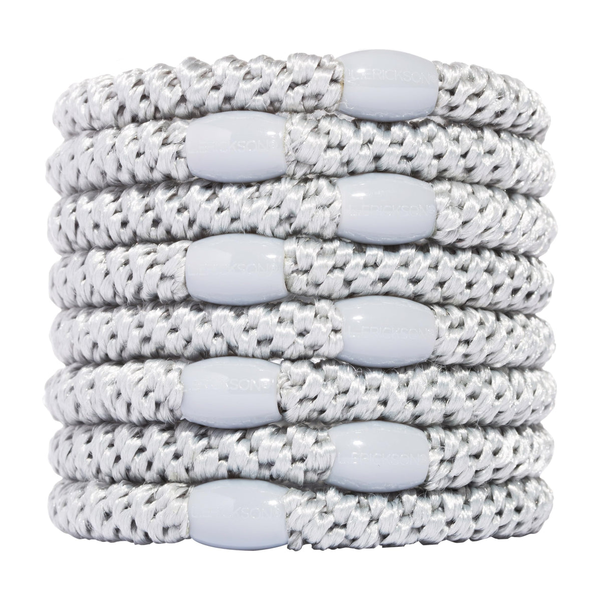 L. Erickson front view of eight silver hair ties showing color and bead for polished hold