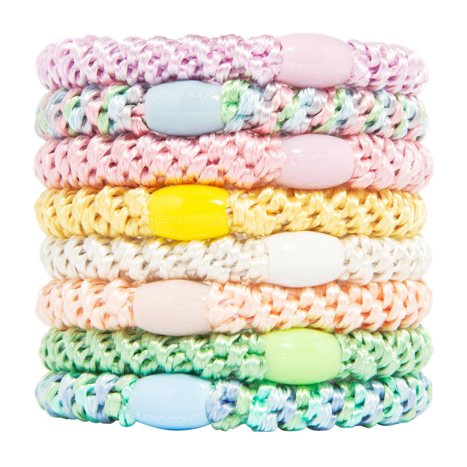 L. Erickson front view of eight pastel hair ties showing colors and packaging benefit
