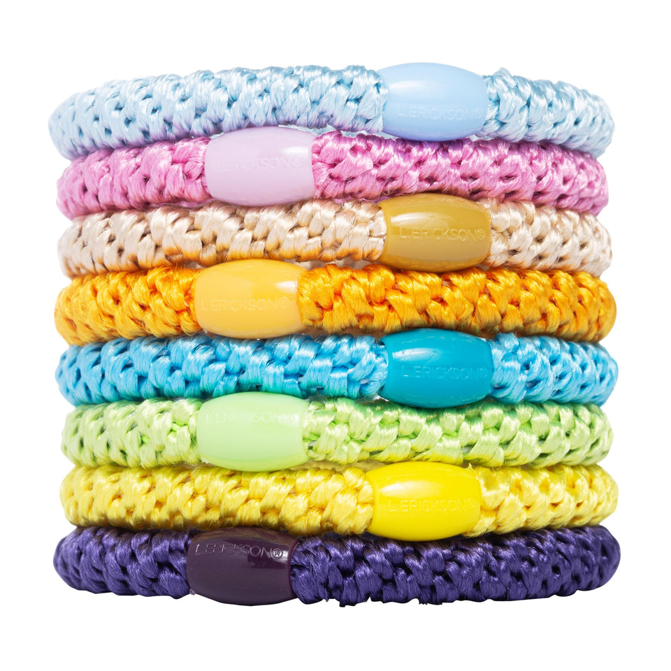 L. Erickson front pack showing eight colorful hair ties, quick grab convenience