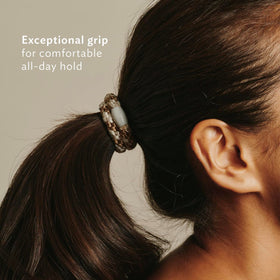 L. Erickson hair tie securing a thick ponytail for strong, all-day hold