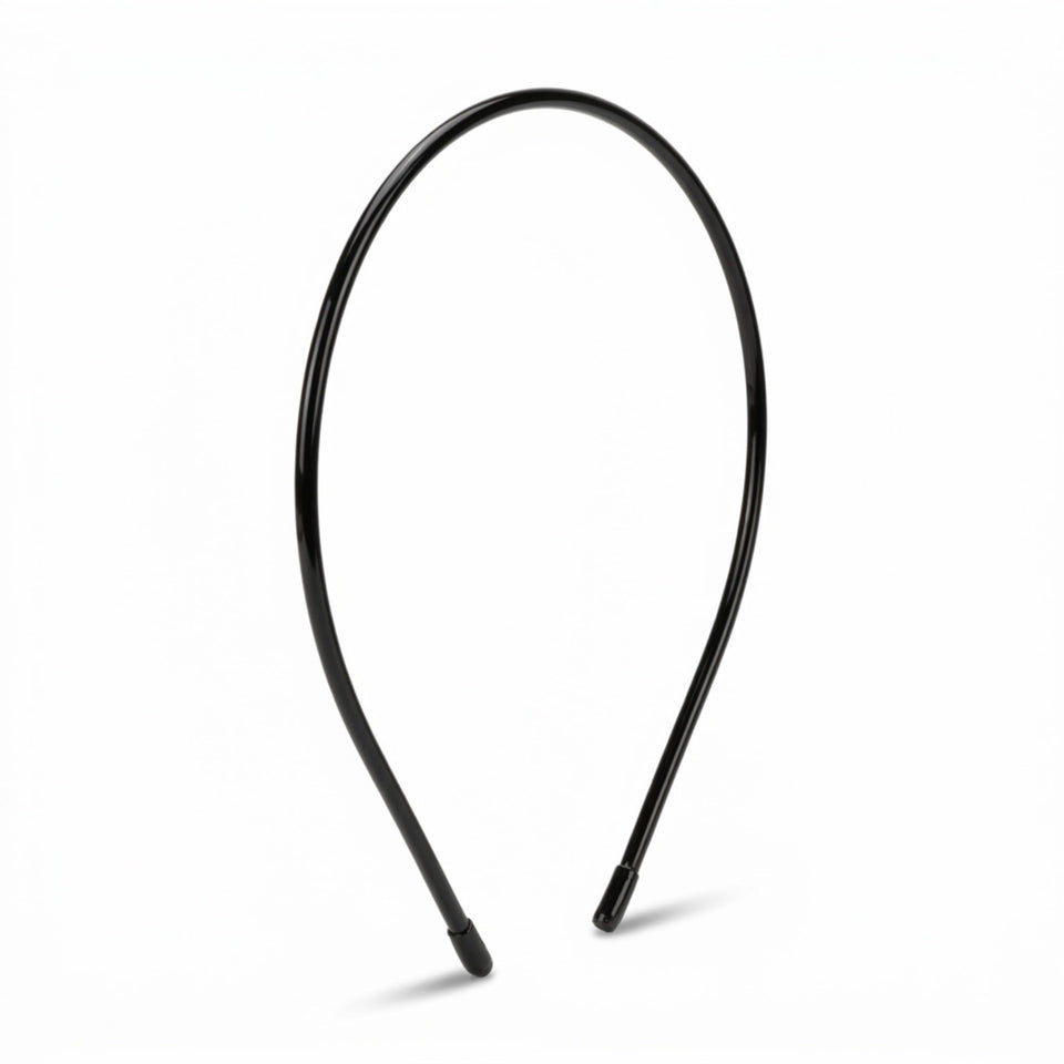 L. Erickson front view of black Twiggy headband showing slim silhouette and polished look
