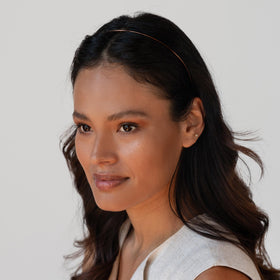 L. Erickson headband in simple packaging suggesting gift-ready presentation and convenience