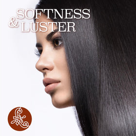 L LUSETA argan oil on bathroom vanity in a styling routine setting