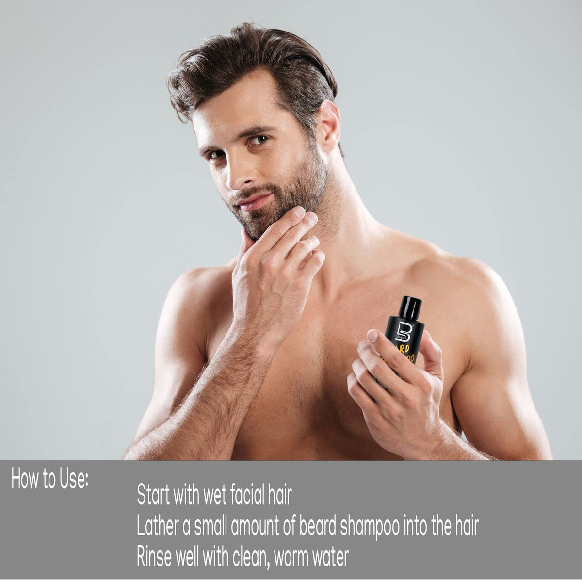 L3 beard shampoo bottle in hand for scale showing convenient size