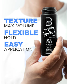 Model applying L3 powder to dry hair for texture and piecey separation