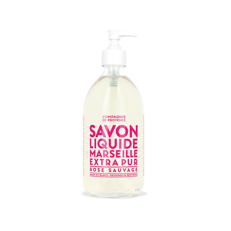 La Compagnie de Provence front bottle shows elegant glass and wild rose scent benefit