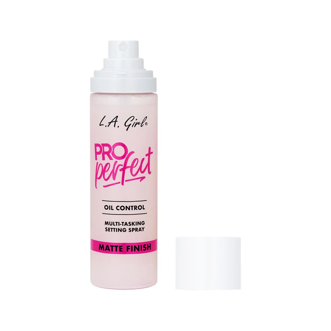 L.A. Girl bottle next to common items to show size and portability benefit
