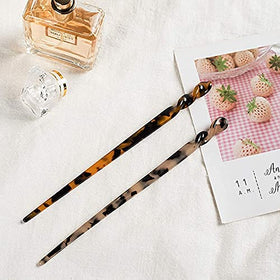 La Jolie Jasmin hair sticks worn in an outdoor portrait, vintage style enhancement for outfits