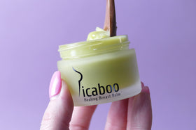 La Parea Wellness jar inside purse ready for on-the-go chafing relief