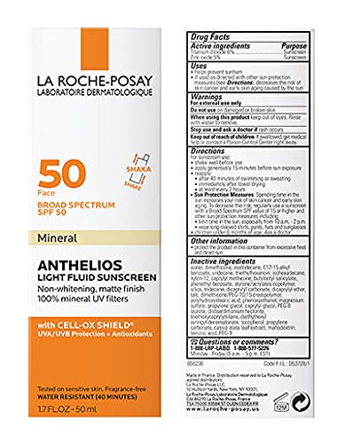La Roche-Posay bottle next to coin for clear size and portability benefit