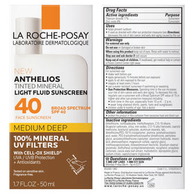 la roche-posay travel size tube beside everyday items for portable sun protection