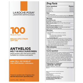 La Roche-Posay on beach towel with sun hat, lifestyle image showing active sun protection