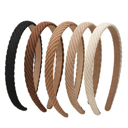 Lahnie front packaging showing five neutral thin headbands and benefits