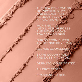 Lancôme brush sweeping ultra-fine powder close-up, demonstrating seamless blending benefit