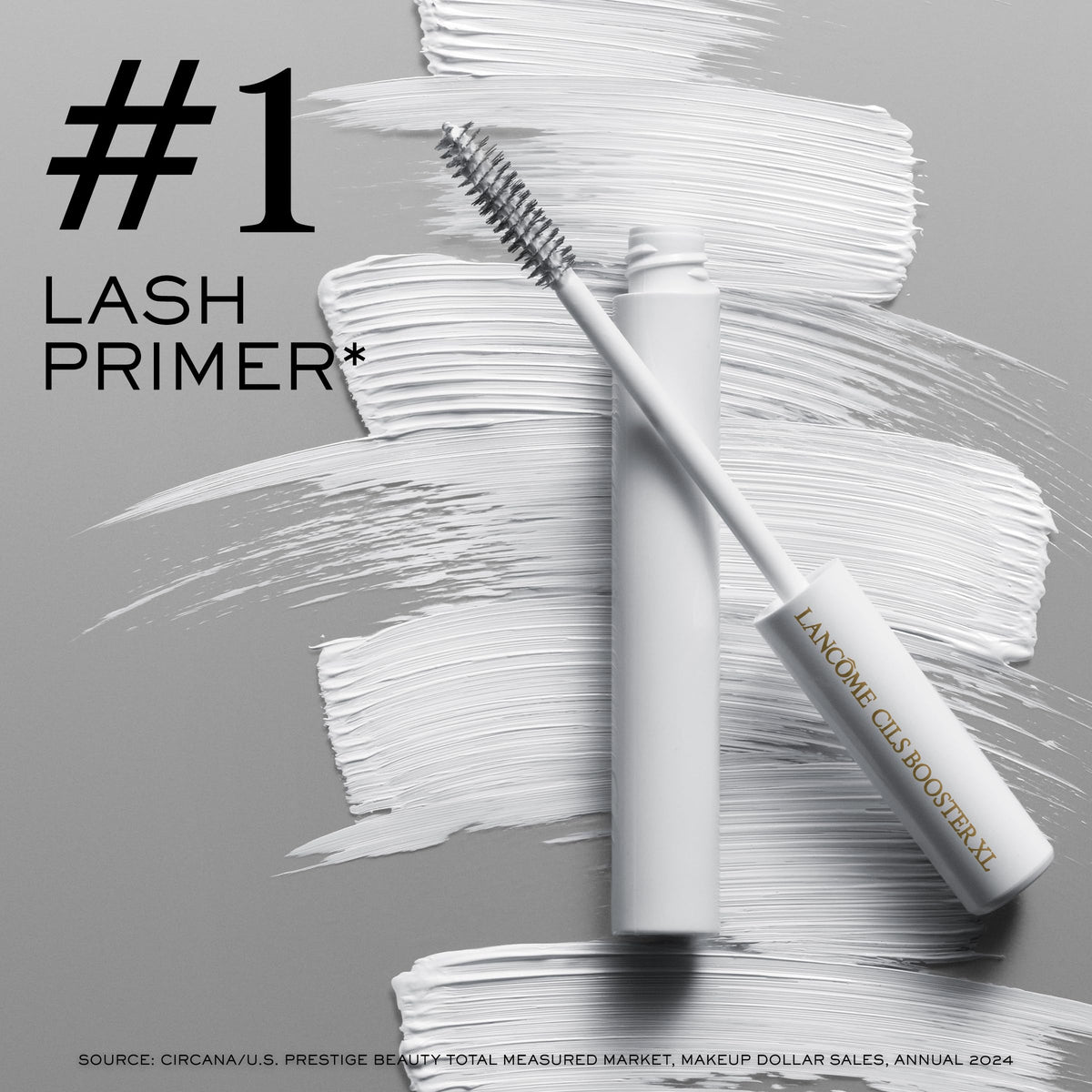 Lancôme primer beside ruler for scale showing compact travel-friendly size